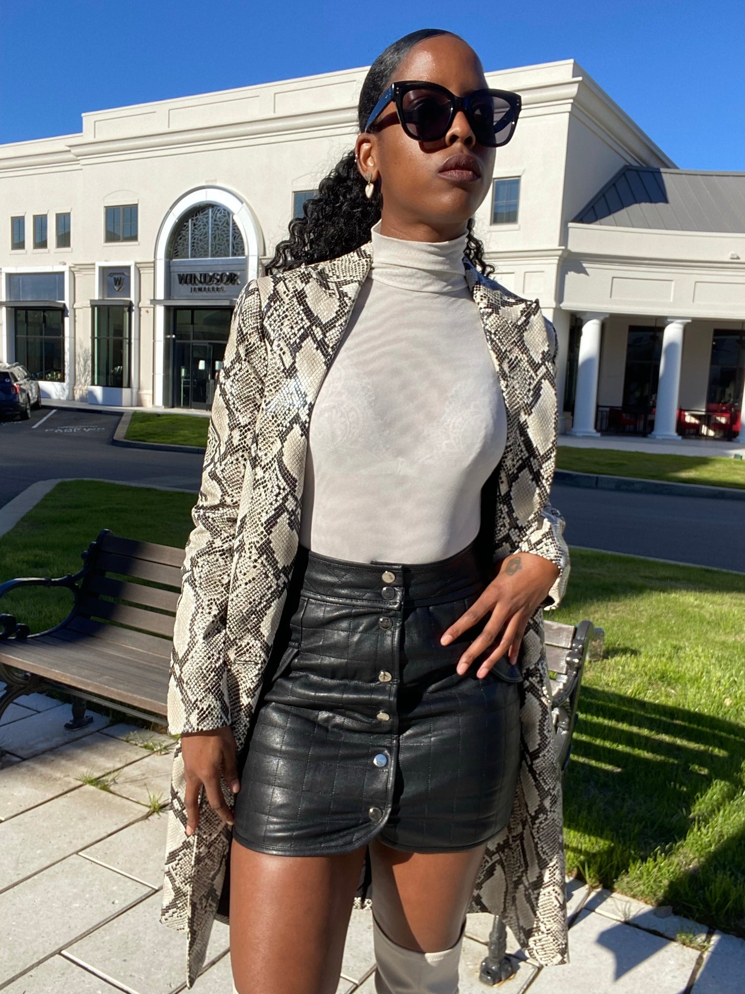 woman in black leather skirt