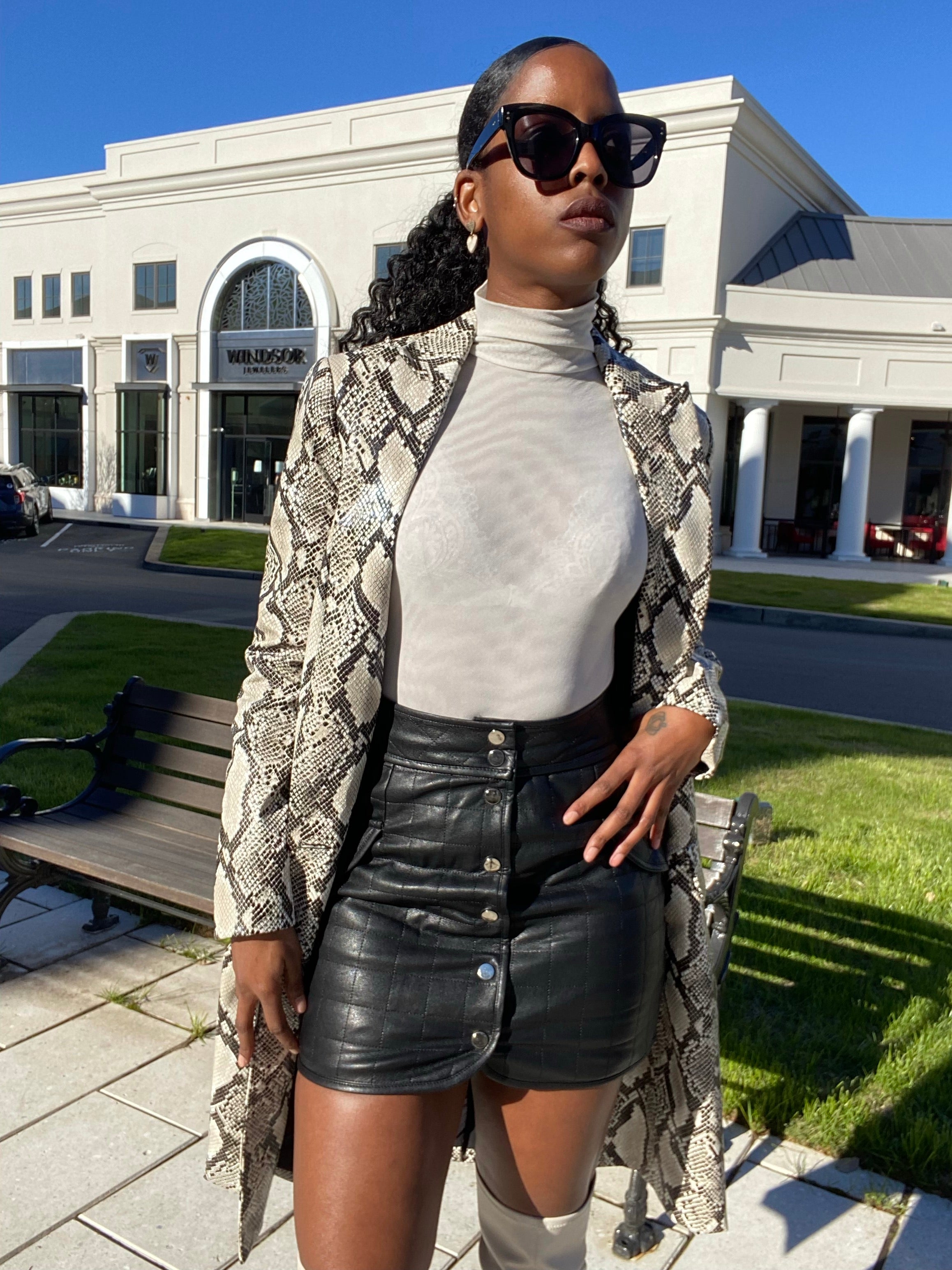 woman in black leather skirt