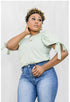 sage green shirt with puff sleeve and tie