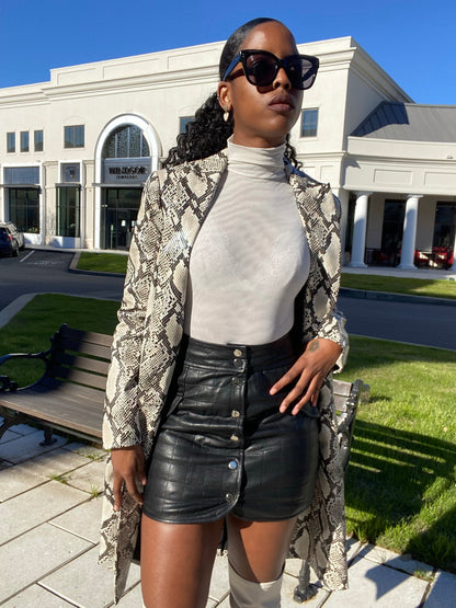 woman in black leather skirt